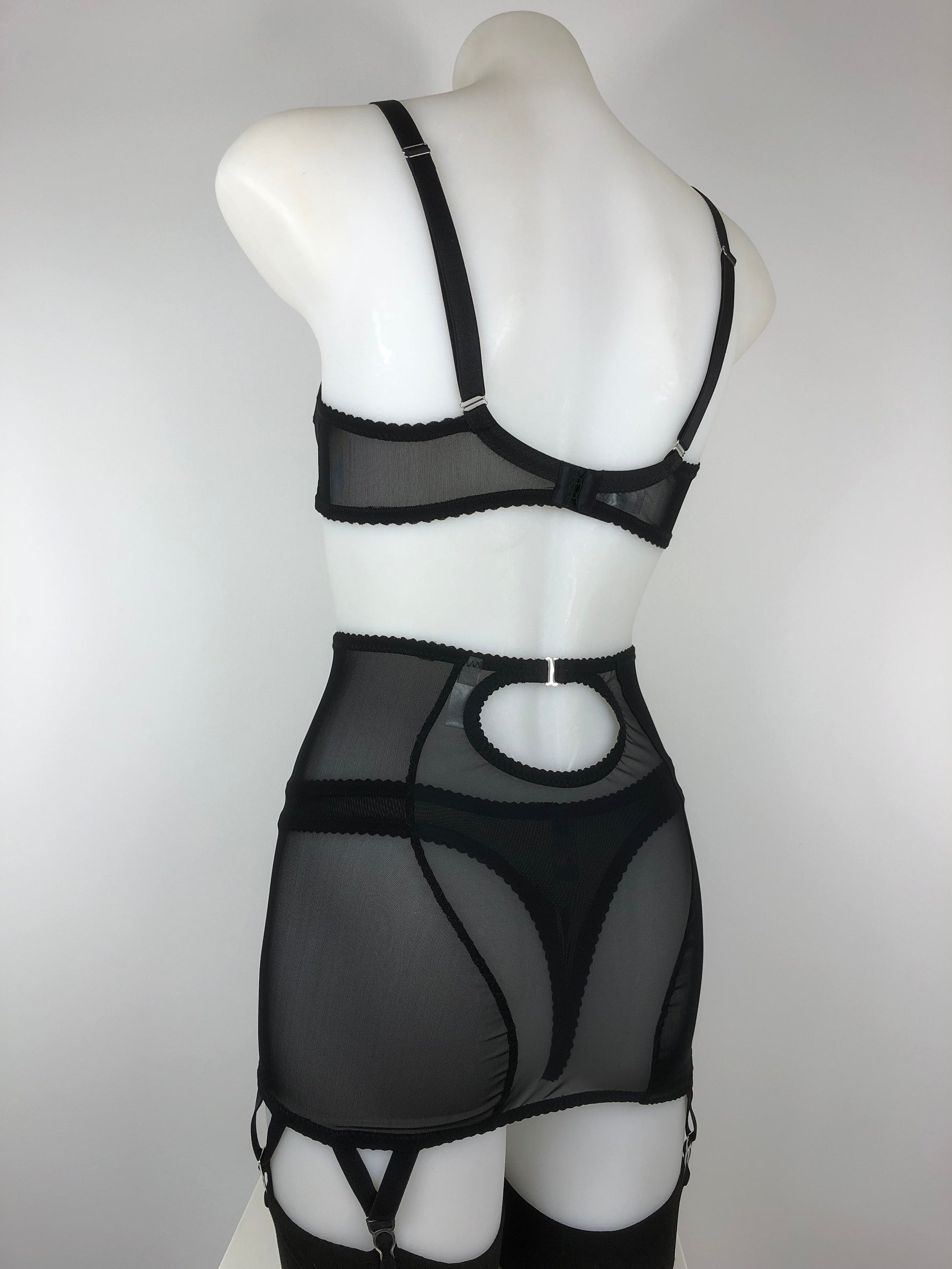 Sheer see through black mesh soft bra bralette, front fastening with two hooks. Transparent fetish bettie page inspired lingerie underwear. Longline girdle and Girdlette and corselette also available