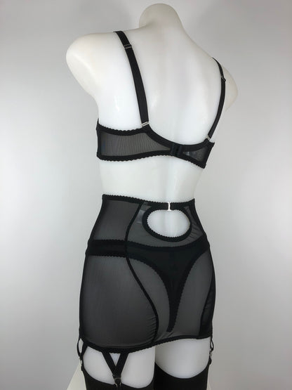 Sheer see through black mesh longline girdle with 6 suspender straps. Transparent fetish bettie page inspired lingerie underwear. Girdlette and corselette also available