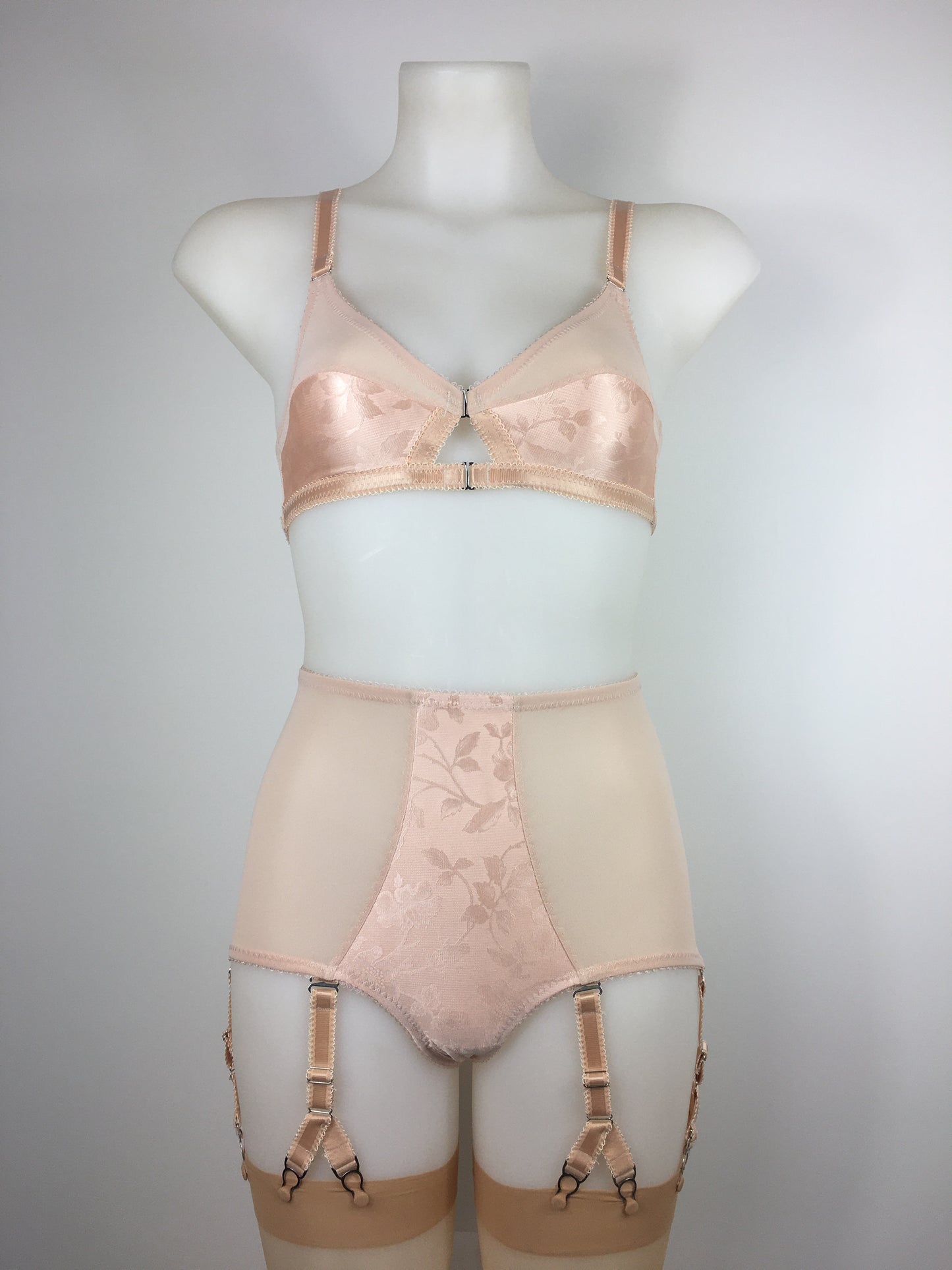 Our most authentic looking vintage inspired lingerie yet. Perfect peachy satin pantie girdle or high waisted knicker with 6 detachable Y straps, characteristic of pip and pantalaimon. Nude big shapewear knickers with garter straps to keep your seamed stockings in place all day. Fabulous faux and reproduction lingerie made in the uk